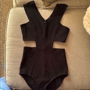 Express body suit with cutouts